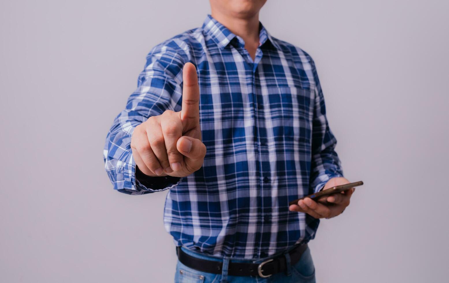 Asian engineer in striped shirt on white background photo