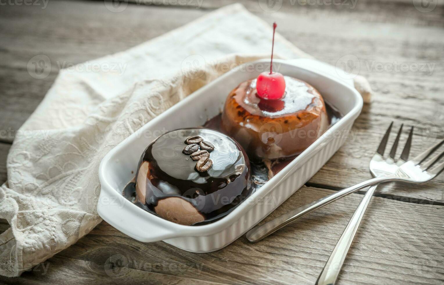 Coffee panna cotta under chocolate and strawberry topping photo