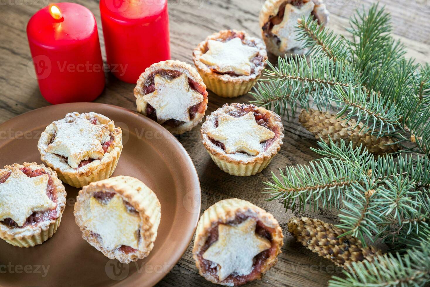 Mince pies with Christmas tree branch photo