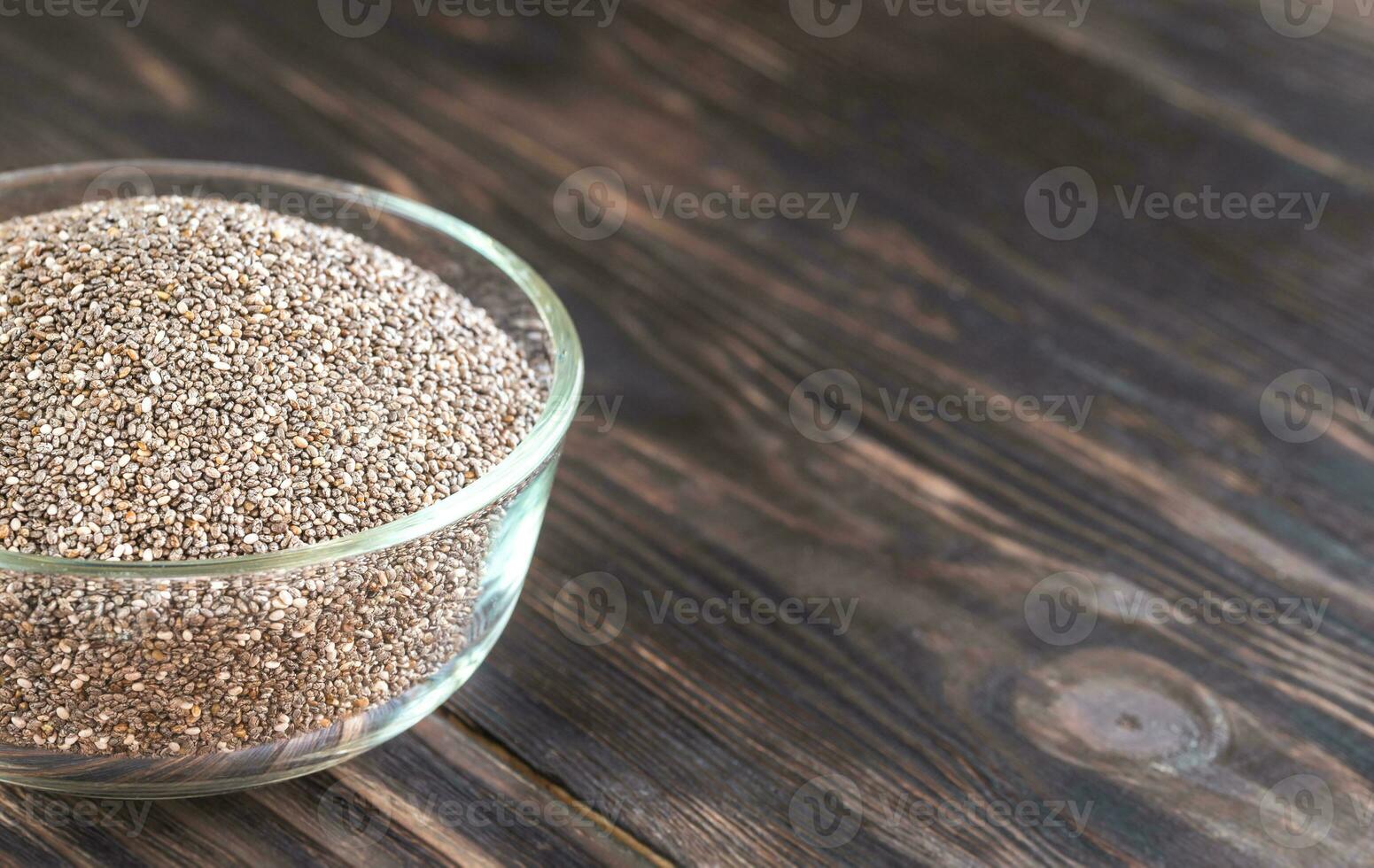Glass bowl of chia seeds photo