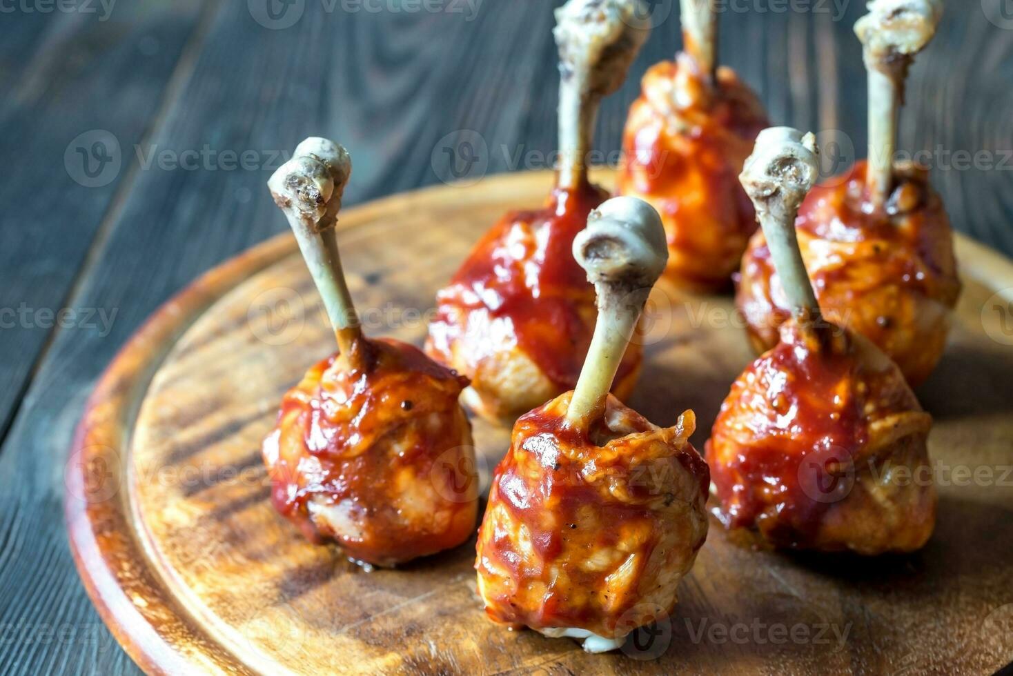 Chicken drumsticks in barbecue sauce photo