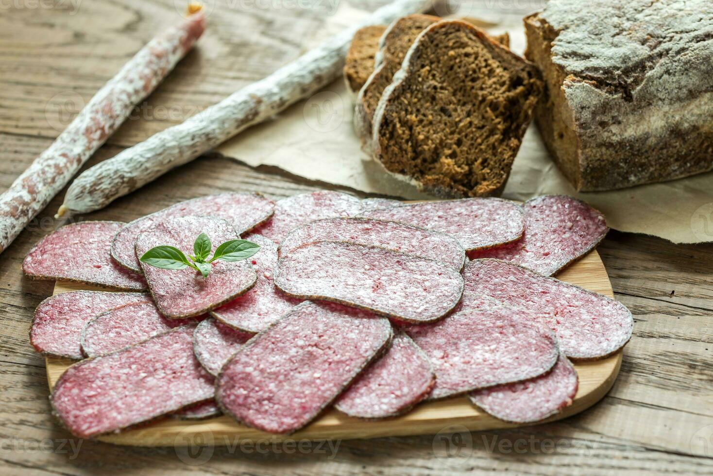 Salami with bread 27799644 Stock Photo at Vecteezy