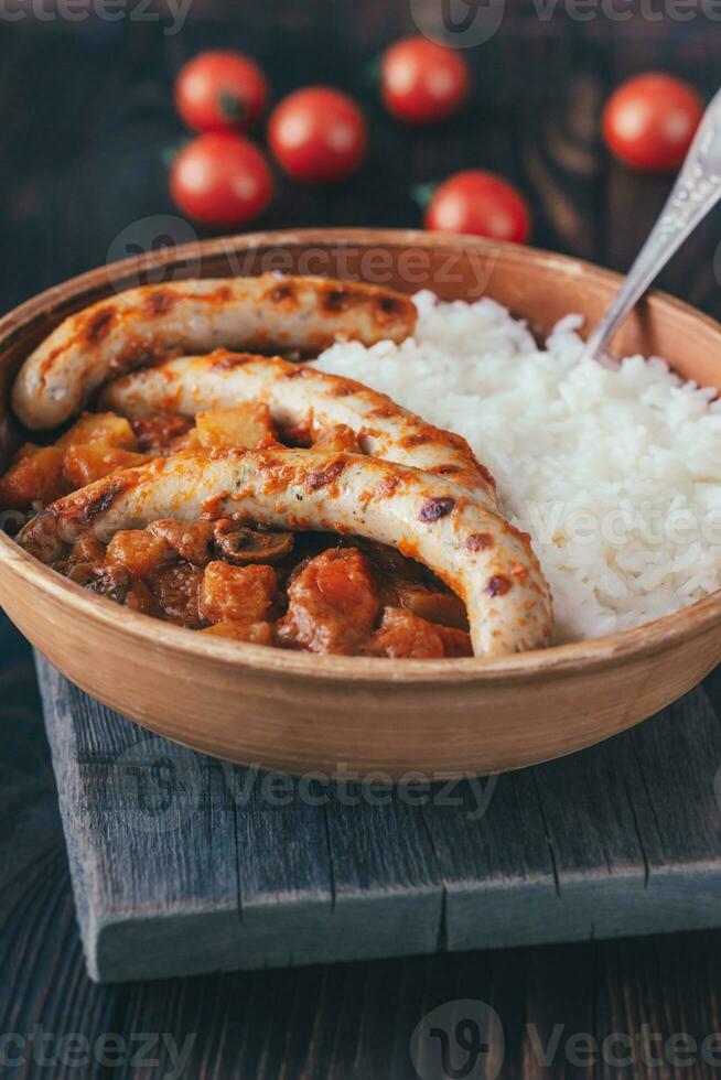 Thai red curry with sausages photo