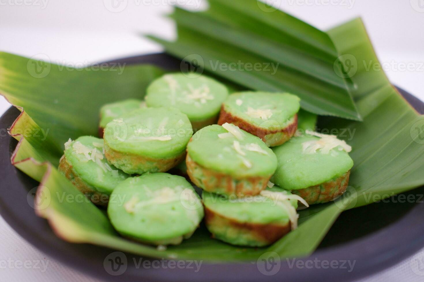 Pandan flavored cake with beautiful green leaves photo