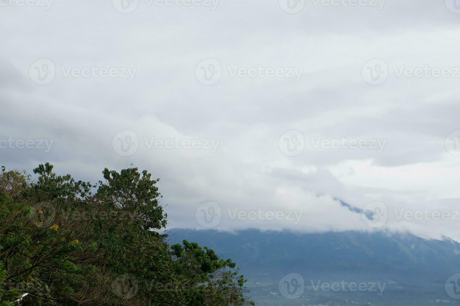 Landscape view of the mountain and cloudy sky with copy space photo