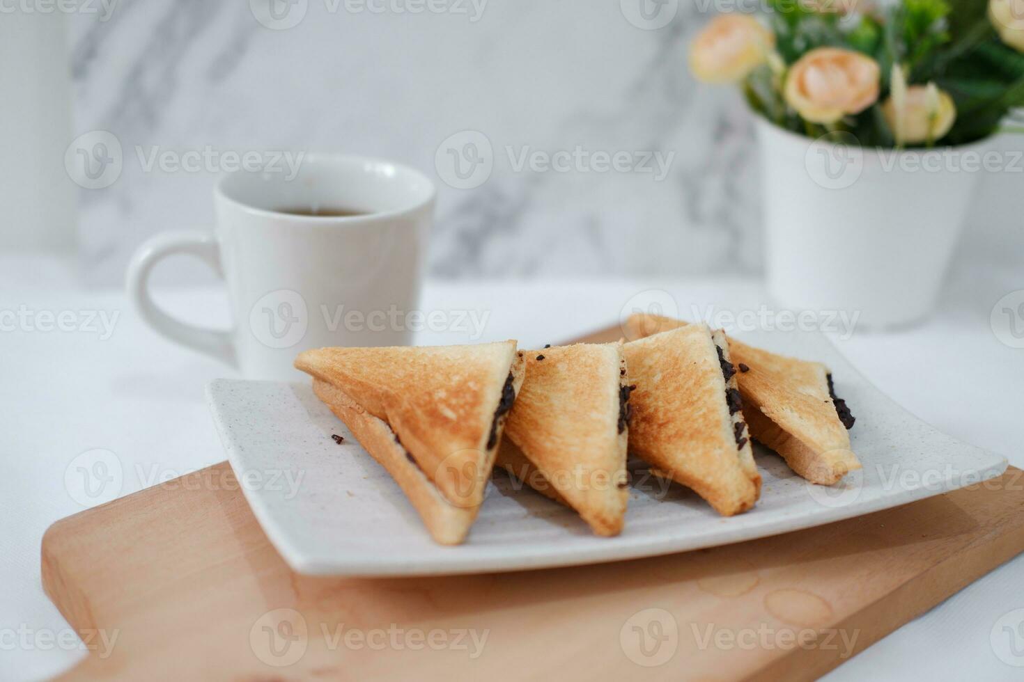 Coffee and toast on the table photo
