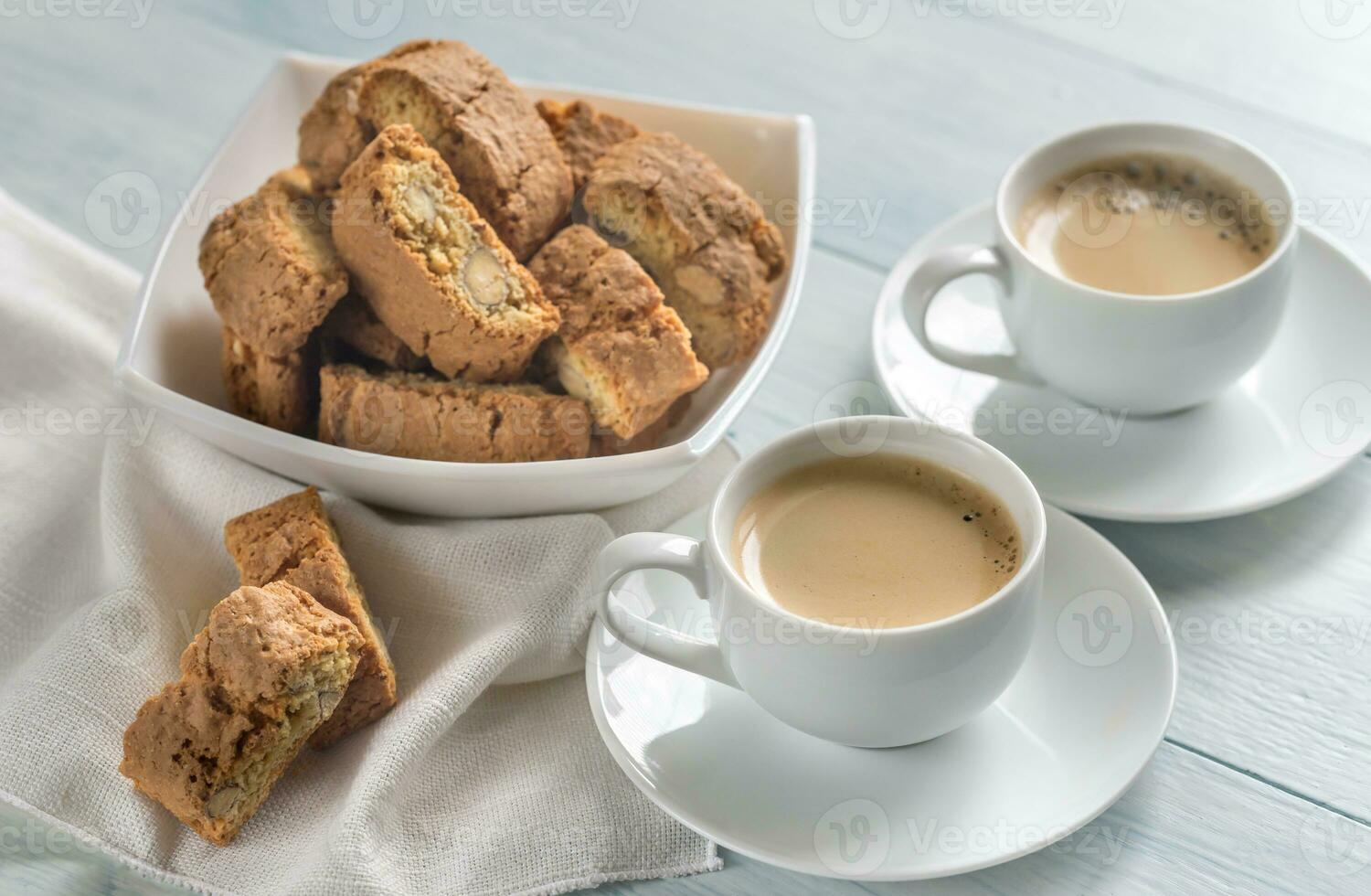 Two cups of coffee with cantuccini photo