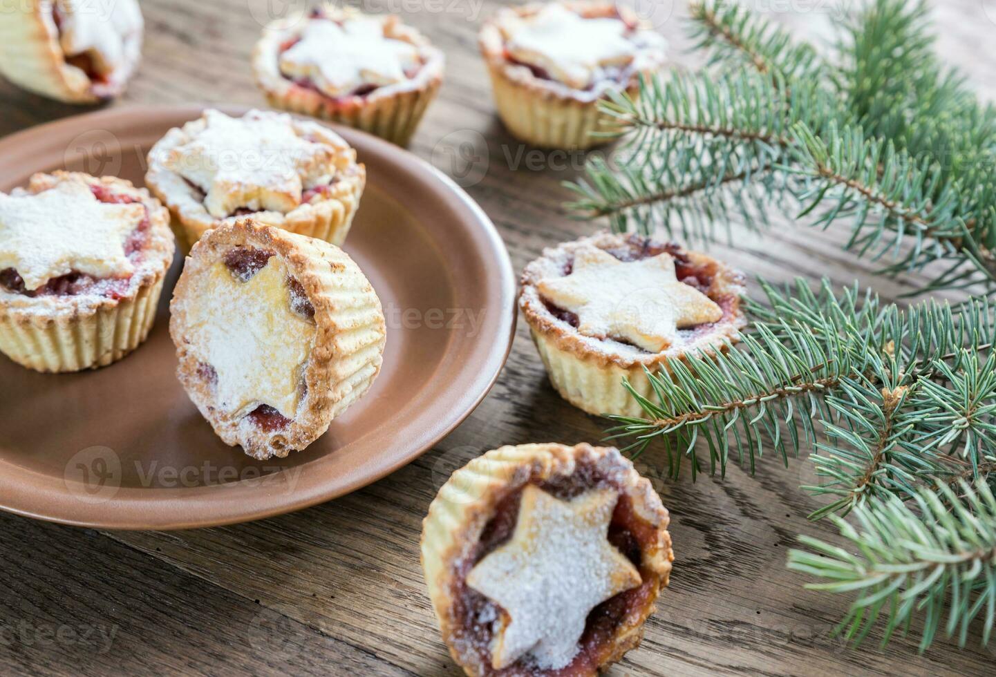 Mince pies with Christmas tree branch photo