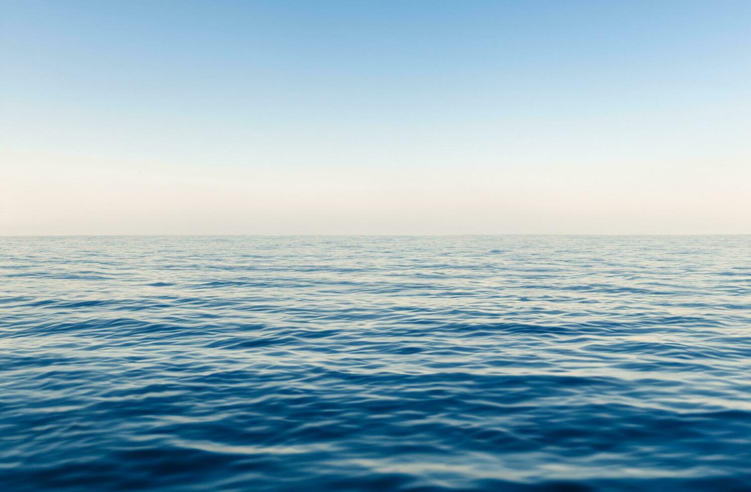 Blue water surface background photo