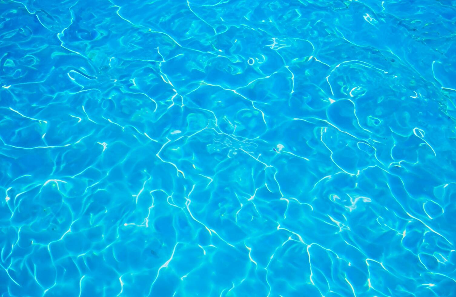 Blue water surface background photo