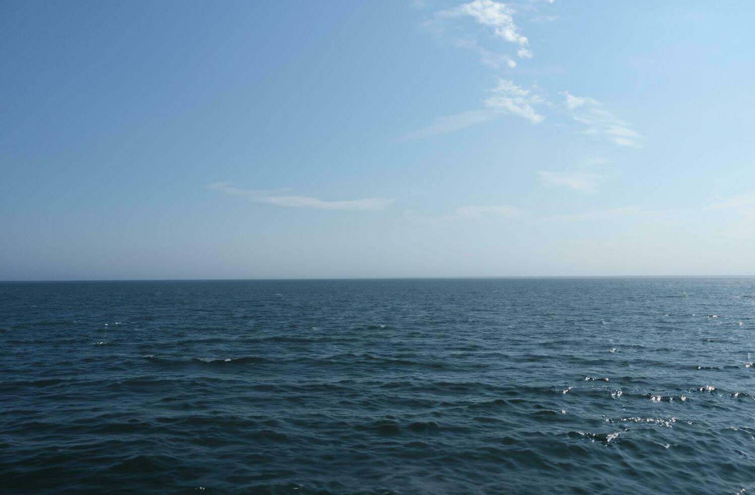 Blue water surface background photo