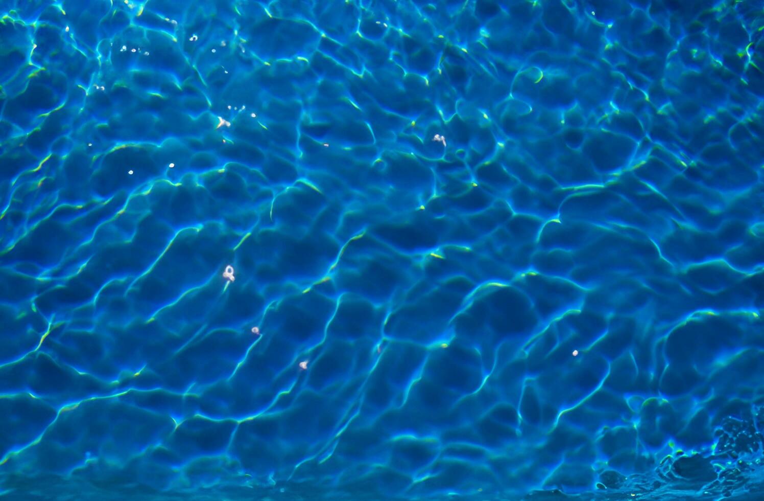 Blue water surface background photo