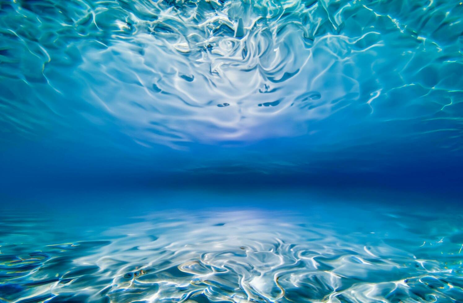 Blue water surface background photo
