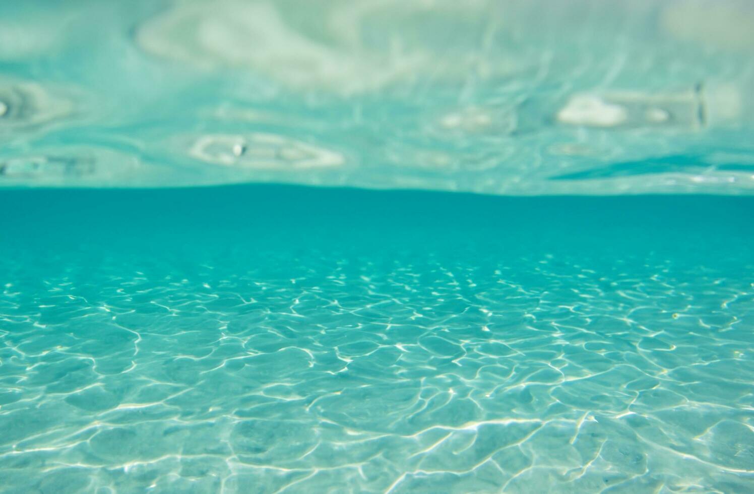 Blue water surface background photo