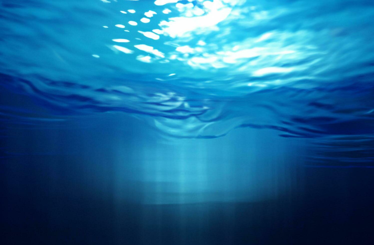 Blue water surface background photo