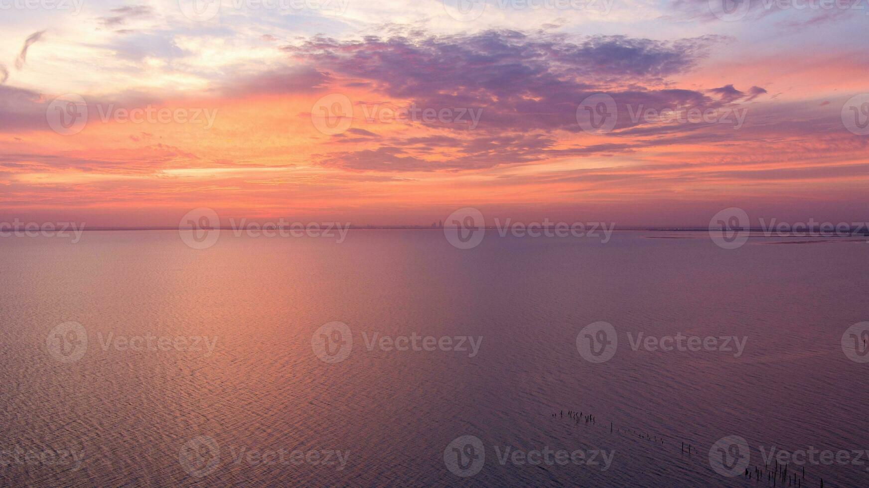 mobile bay at sunset in daphne, alabama photo