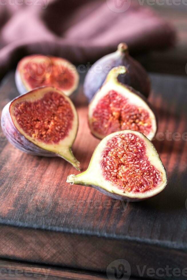 Fresh figs on the wooden board photo