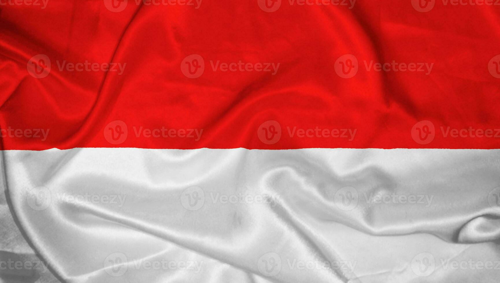 indonesio nación bandera ondulado satín parte superior ángel foto