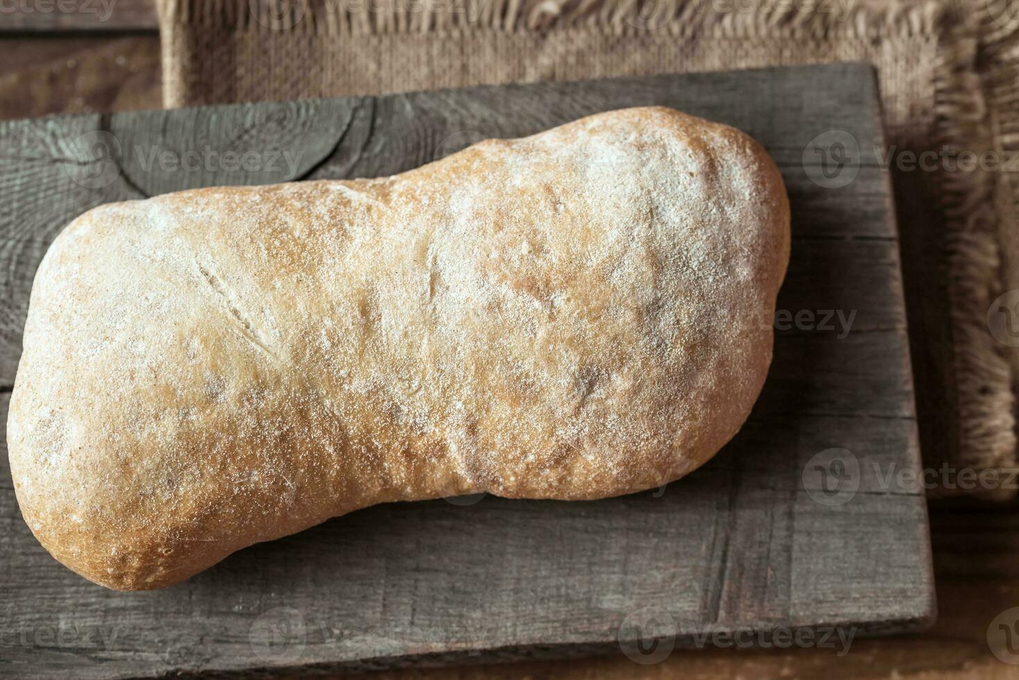 Ciabatta on the wooden board photo