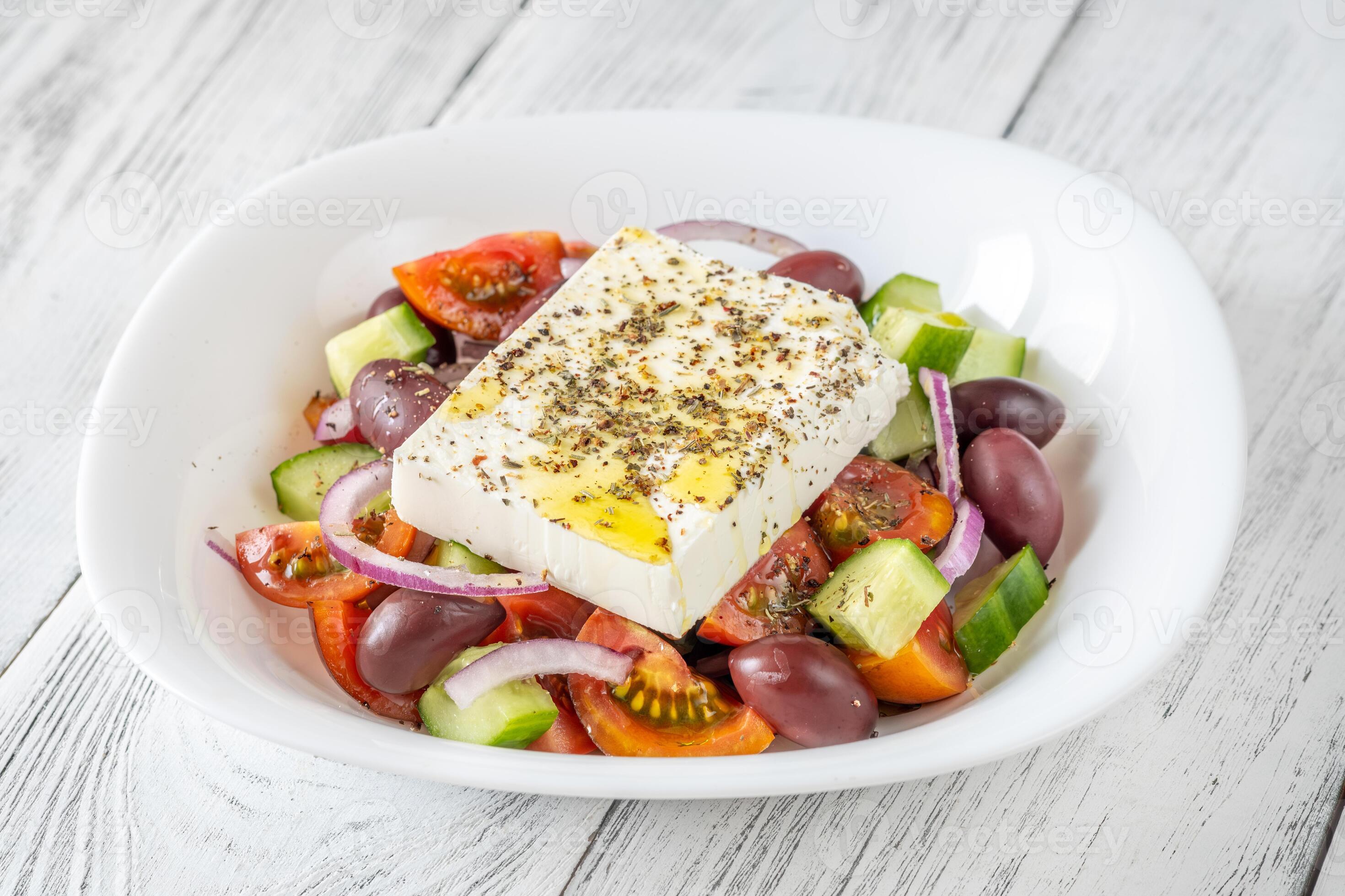 Bowl of Greek salad 27807750 Stock Photo at Vecteezy