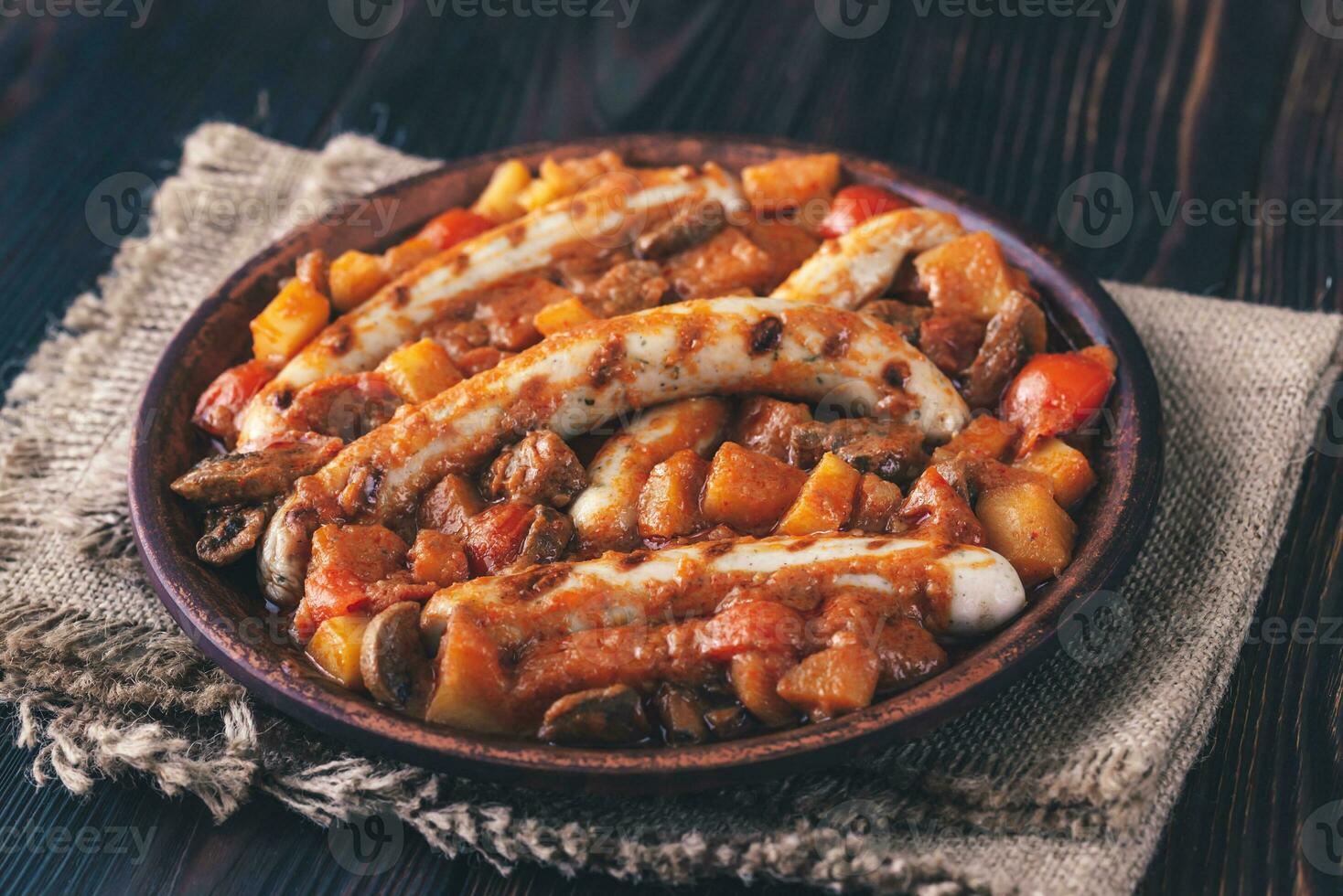 Thai red curry with sausages photo