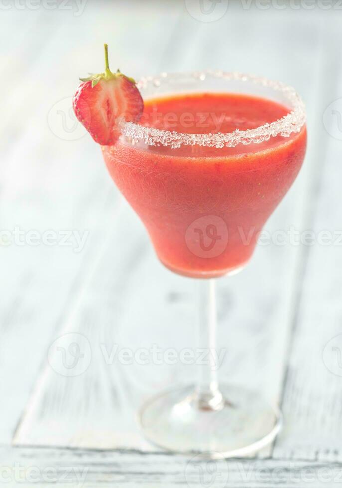 Glass of strawberry margarita cocktail photo