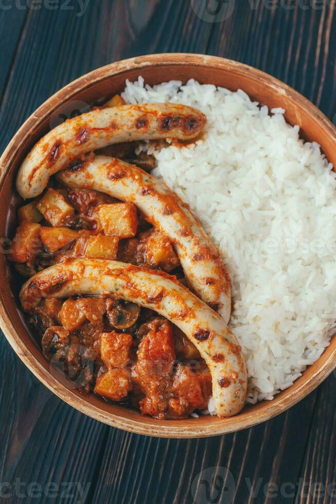 Thai red curry with sausages photo