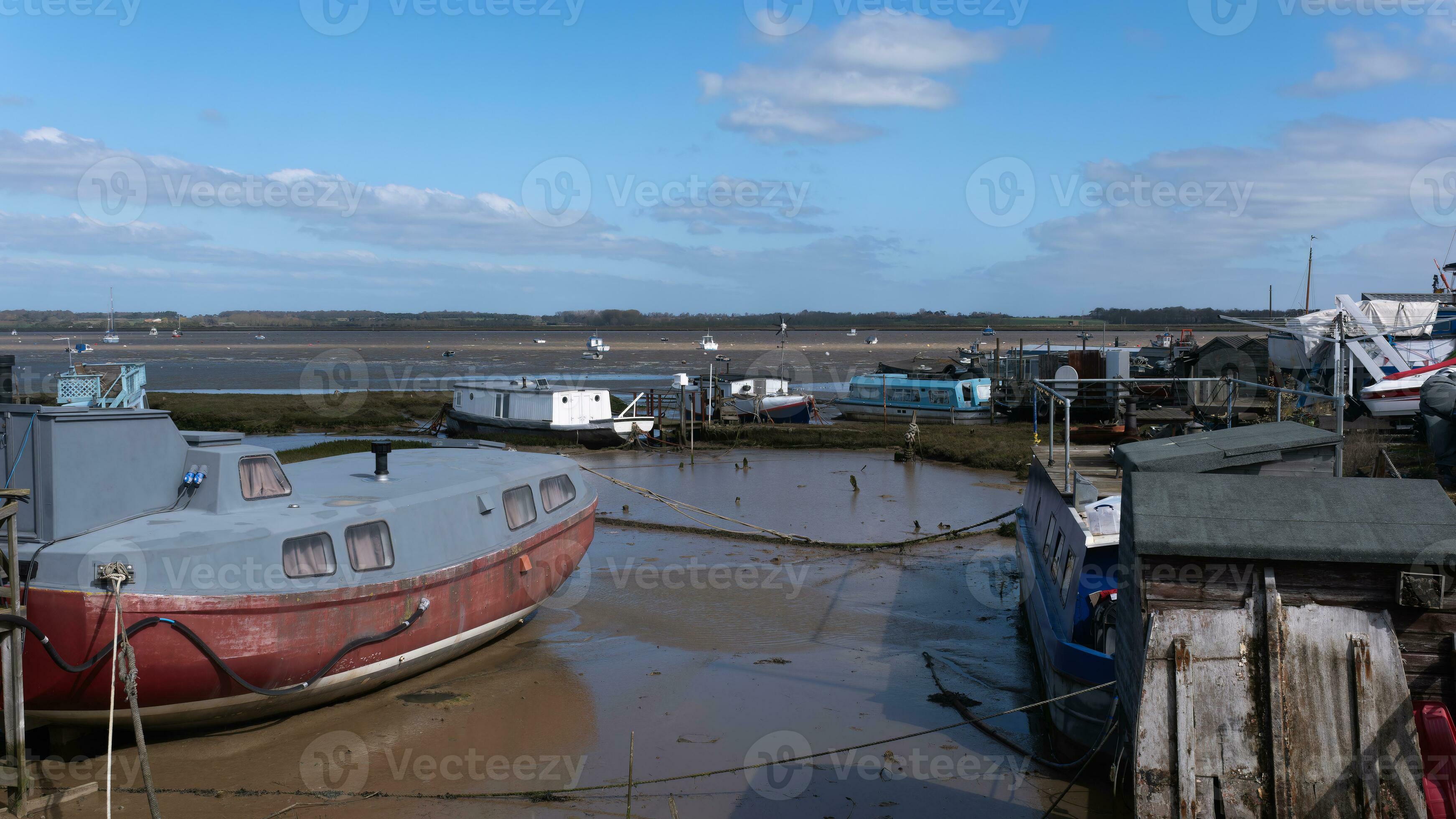 Old houseboat moorings on the Deben 27808152 Stock Photo at Vecteezy