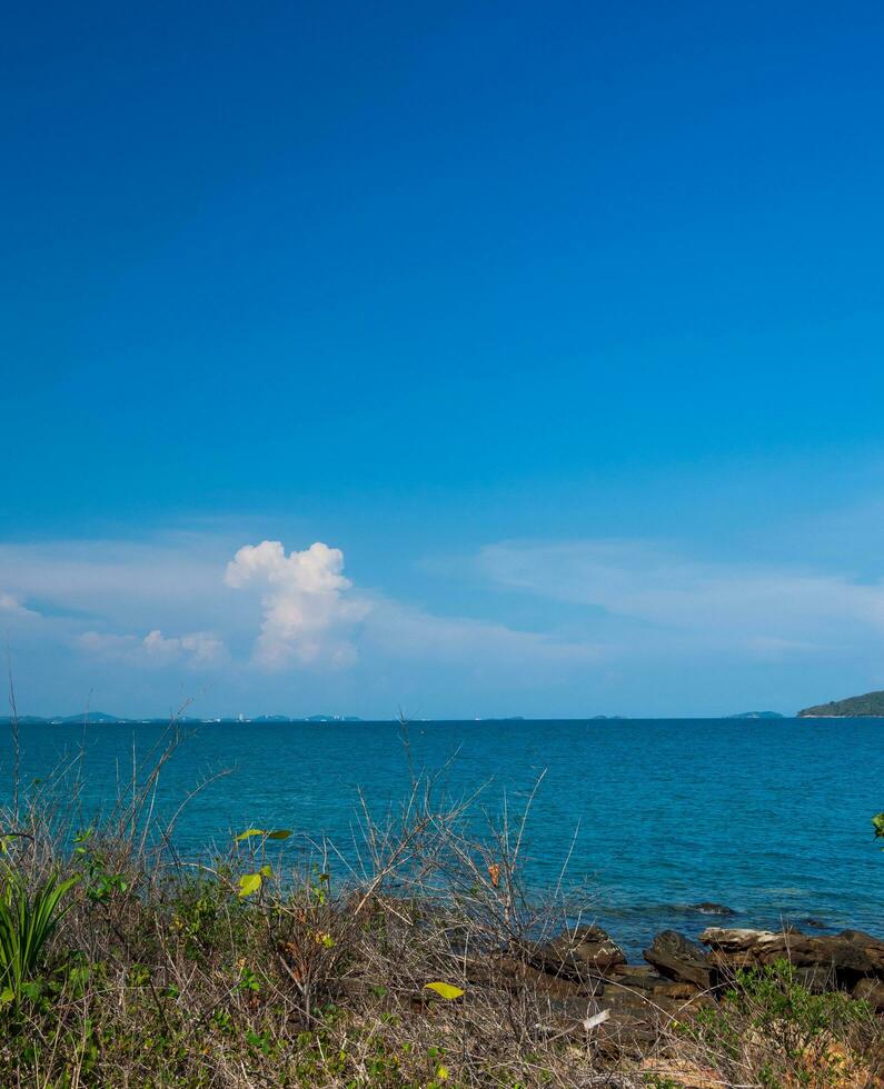 Landscape summer panorama view front nature seen along the mountains rock coast and sea ocean, look blue sky, horizon wind cool breeze, comfortable during the travel day, relax, Rayong, Thailand photo