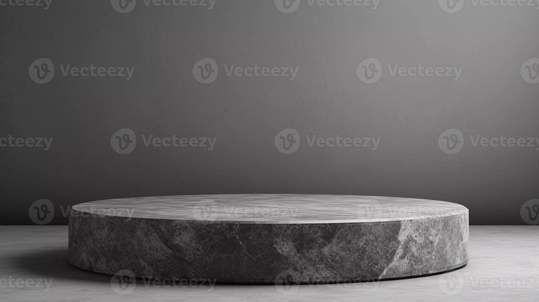 Flat round granite pedestal with small black stones around the granite on textured background and water flowing under the granite stone photo