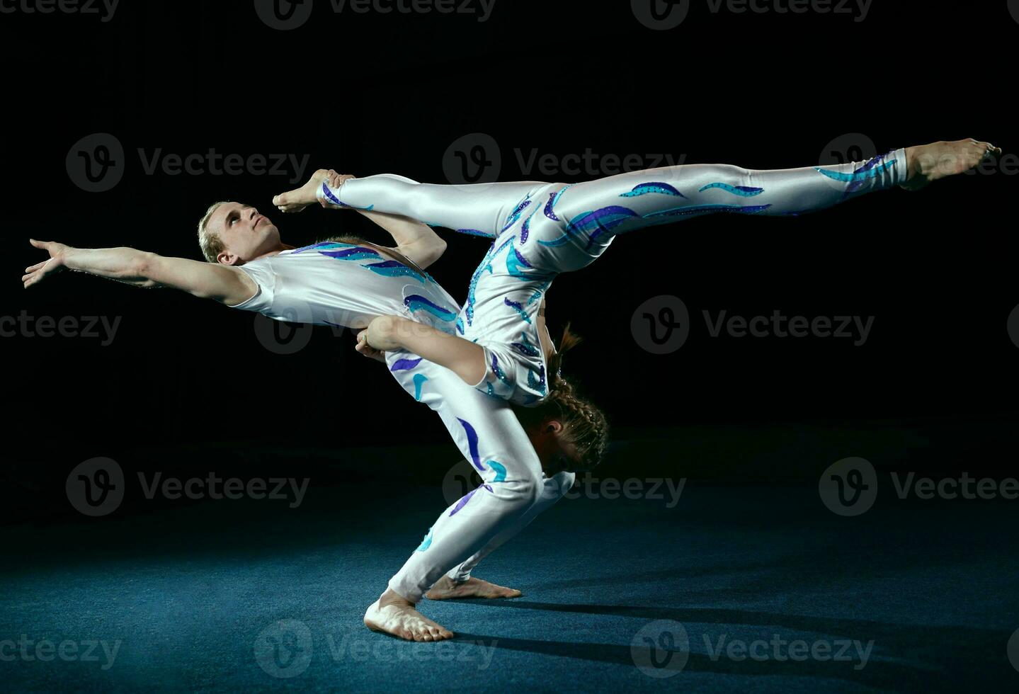 Circus artists perform different tricks. photo
