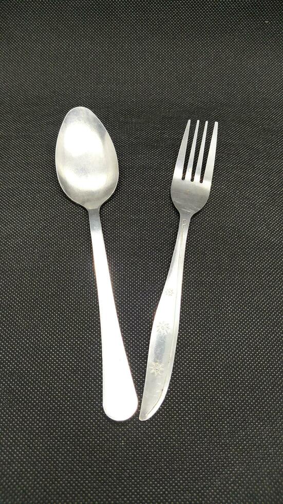 fork with black background 27813466 Stock Photo at Vecteezy