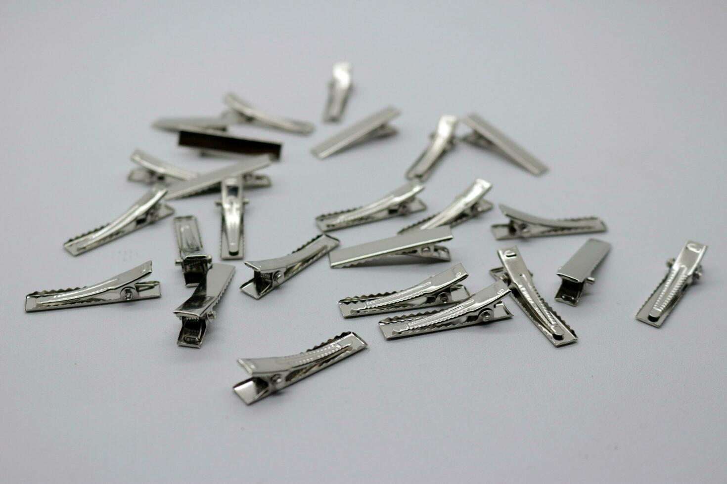 Iron hair clips scattered photo