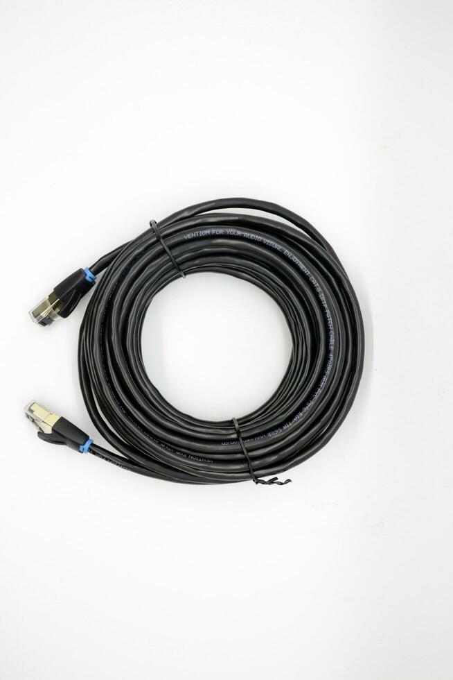 Black internet cable neatly rolled up photo