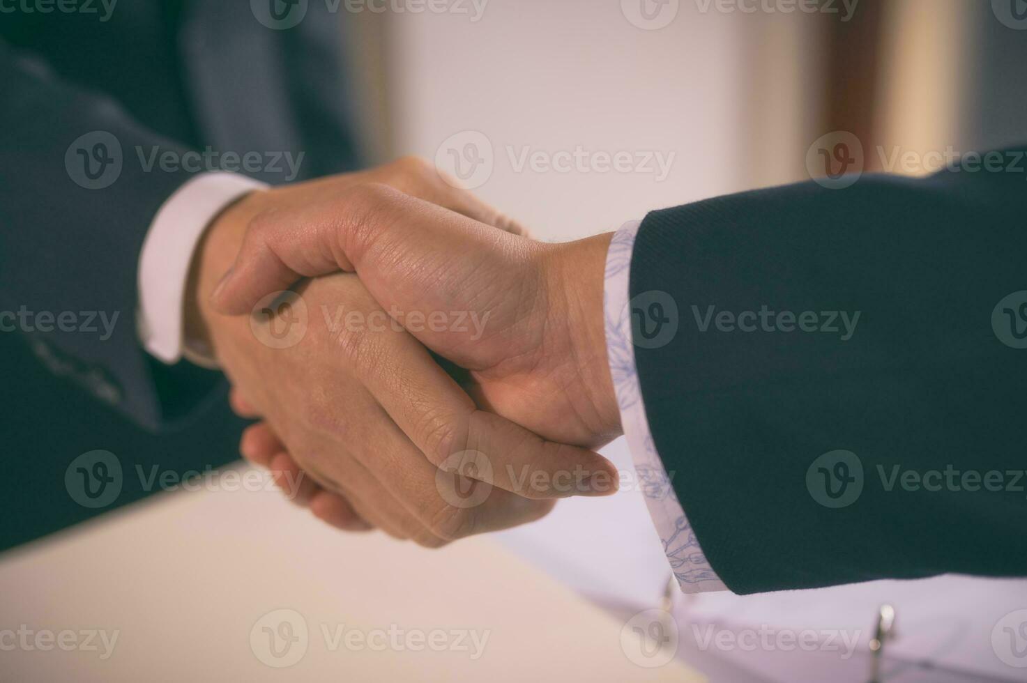 businessman shake hand with partner to celebration partnership and business deal concept, Businessman handshake for teamwork of business merger and acquisition, successful negotiate, hand shake photo