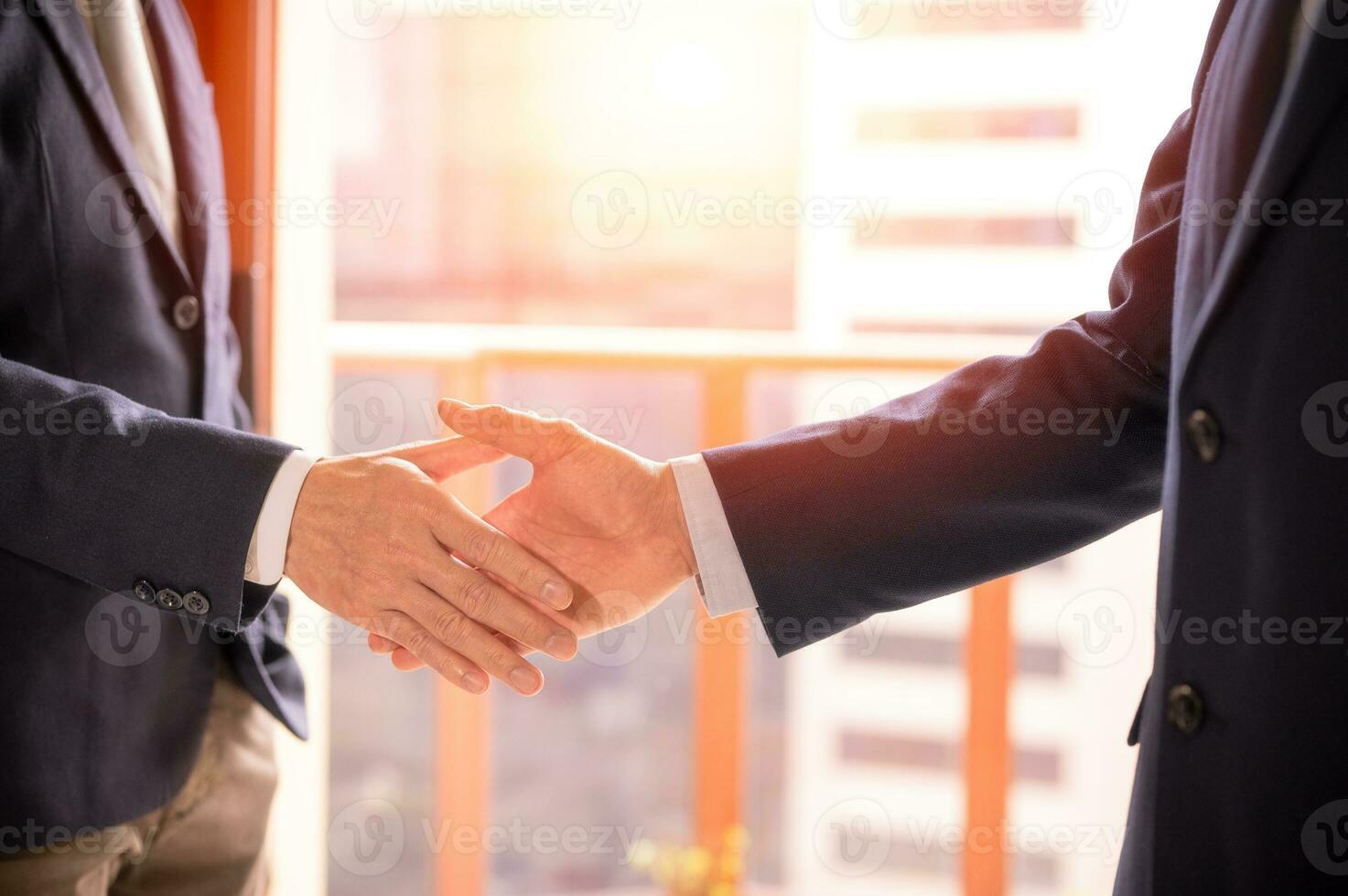 businessman shake hand with partner to celebration partnership and business deal concept, Businessman handshake for teamwork of business merger and acquisition, successful negotiate, hand shake photo