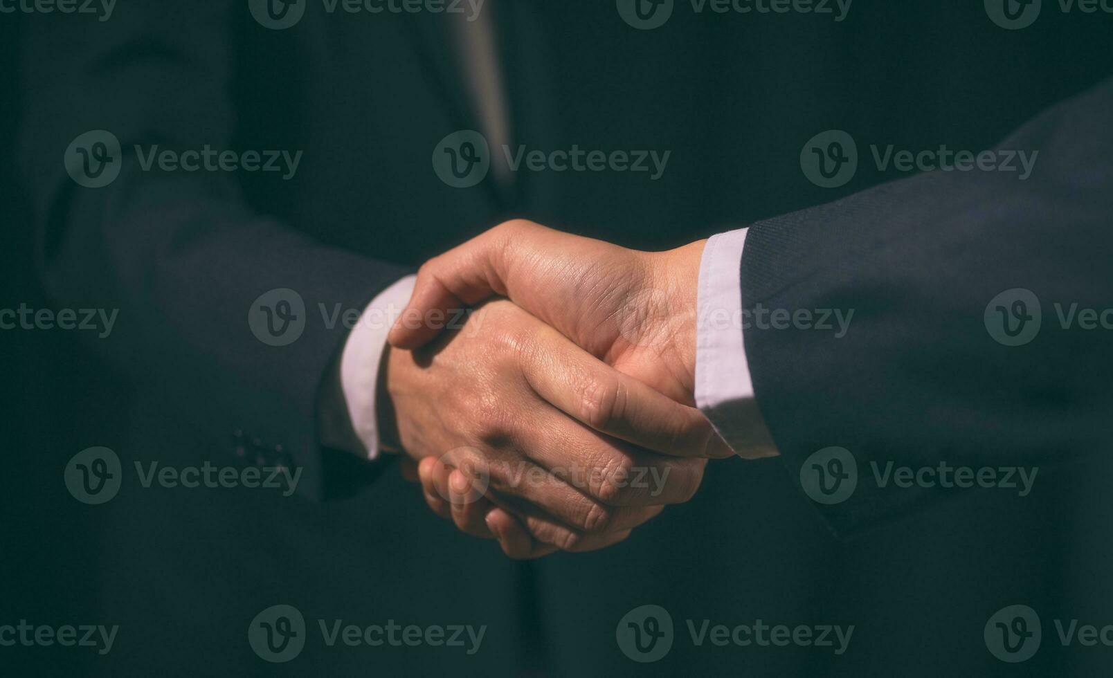 businessman shake hand with partner to celebration partnership and business deal concept, Businessman handshake for teamwork of business merger and acquisition, successful negotiate, hand shake photo