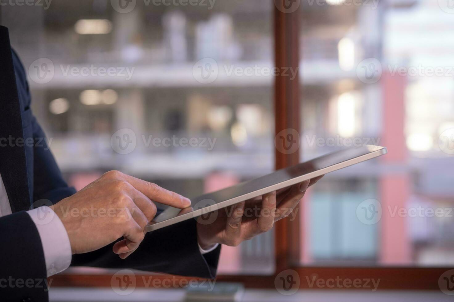 business and technology concept, social media working and life styles, businessman using digital tablet searching surfing on internet network, data analysis business online report photo
