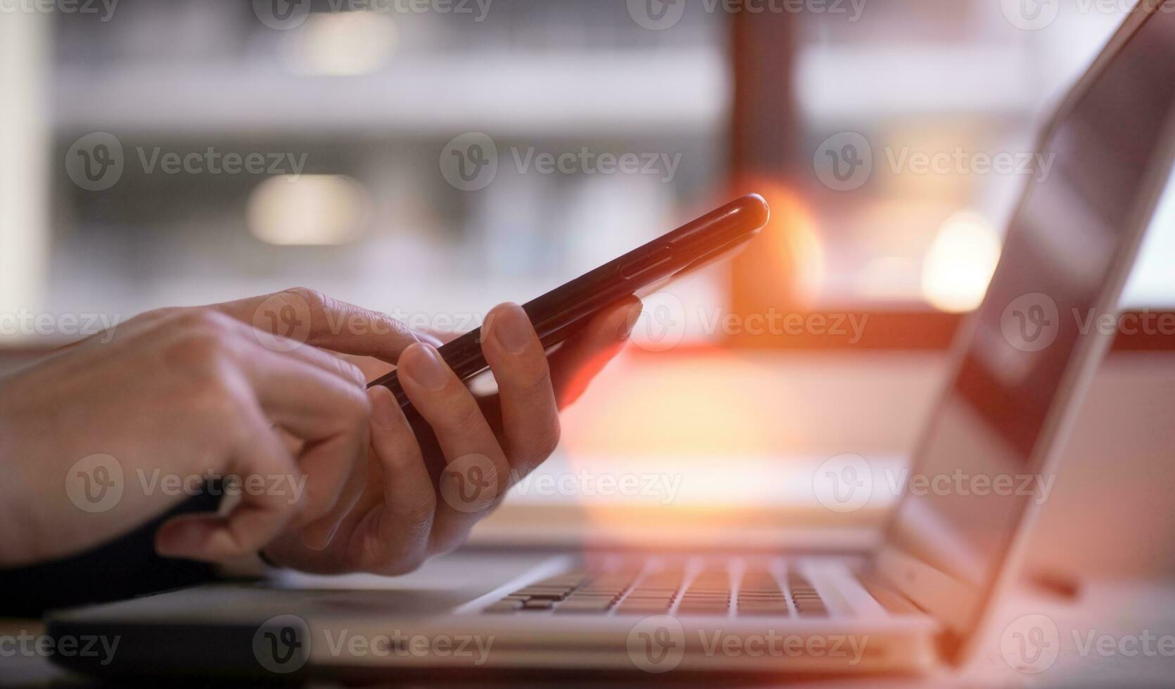 Social media marketing concept. businessman hand using smartphone typing, chatting conversation in chat box icons pop up photo