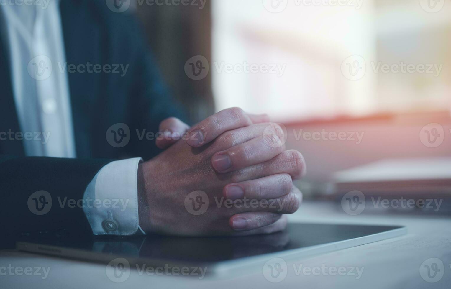 Hands of a thoughtful, hr recruiter making hiring decision at difficult job interview, opponents dialogue debate, business confrontation challenge concept, pray hope and negotiation business dealing photo