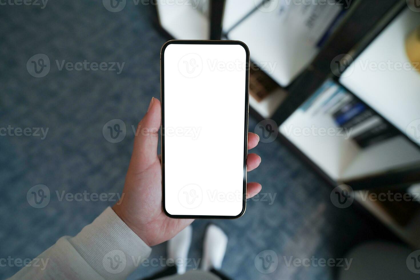 Close up of women's hands holding cell telephone blank copy space screen. smart phone with technology concept photo