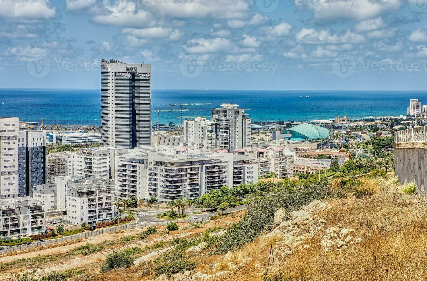 View of the Naot Peres district of Haifa, the stadium and the sea coast photo
