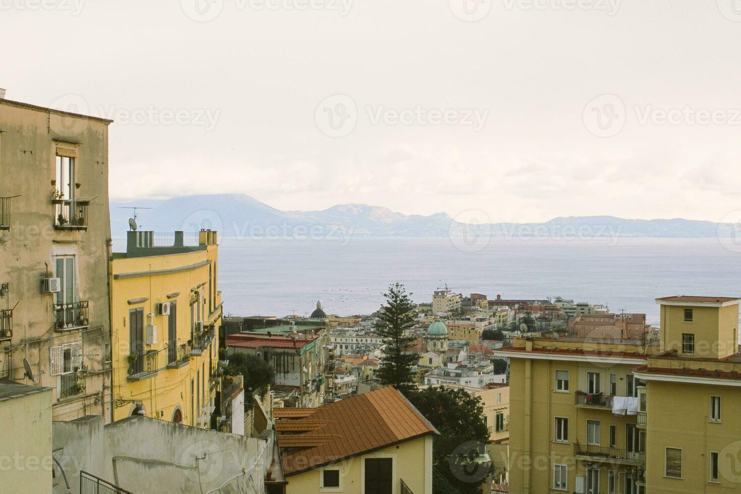 City houses and Gulf of Naples in Italy. photo