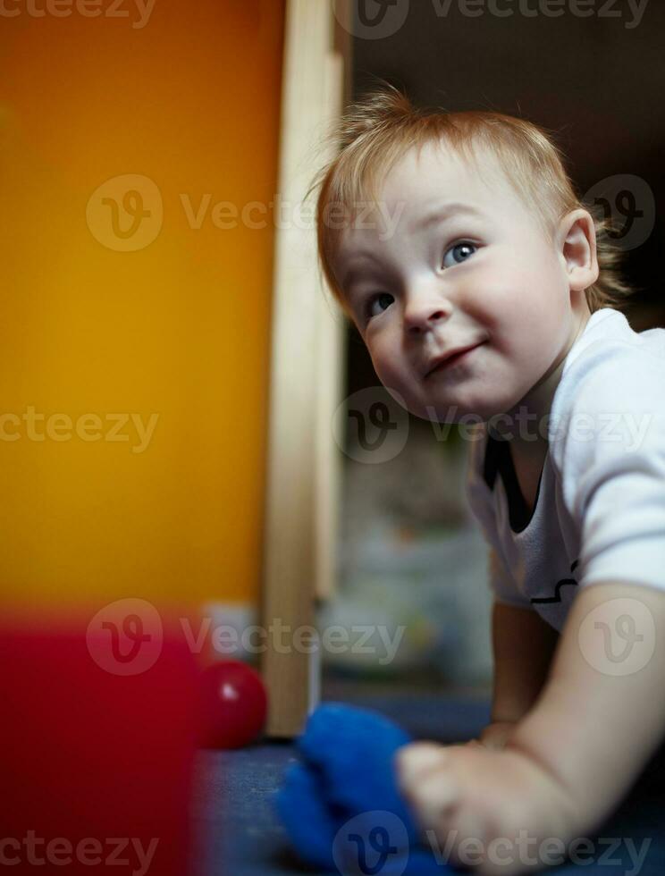 The baby is playing happily photo