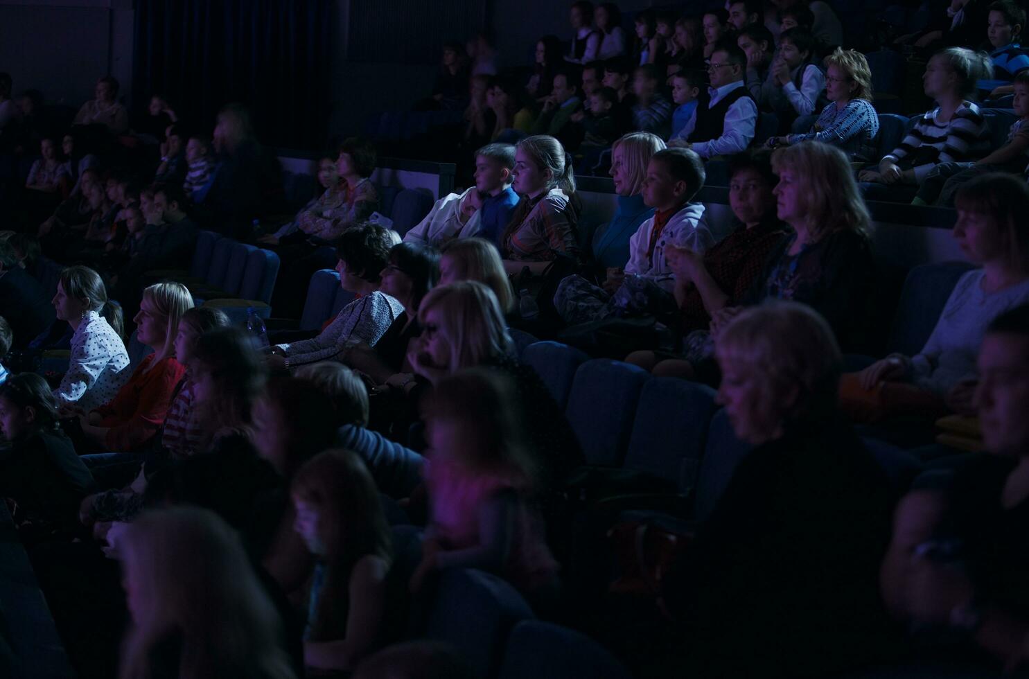 Audience applauding, during a spectacular event photo