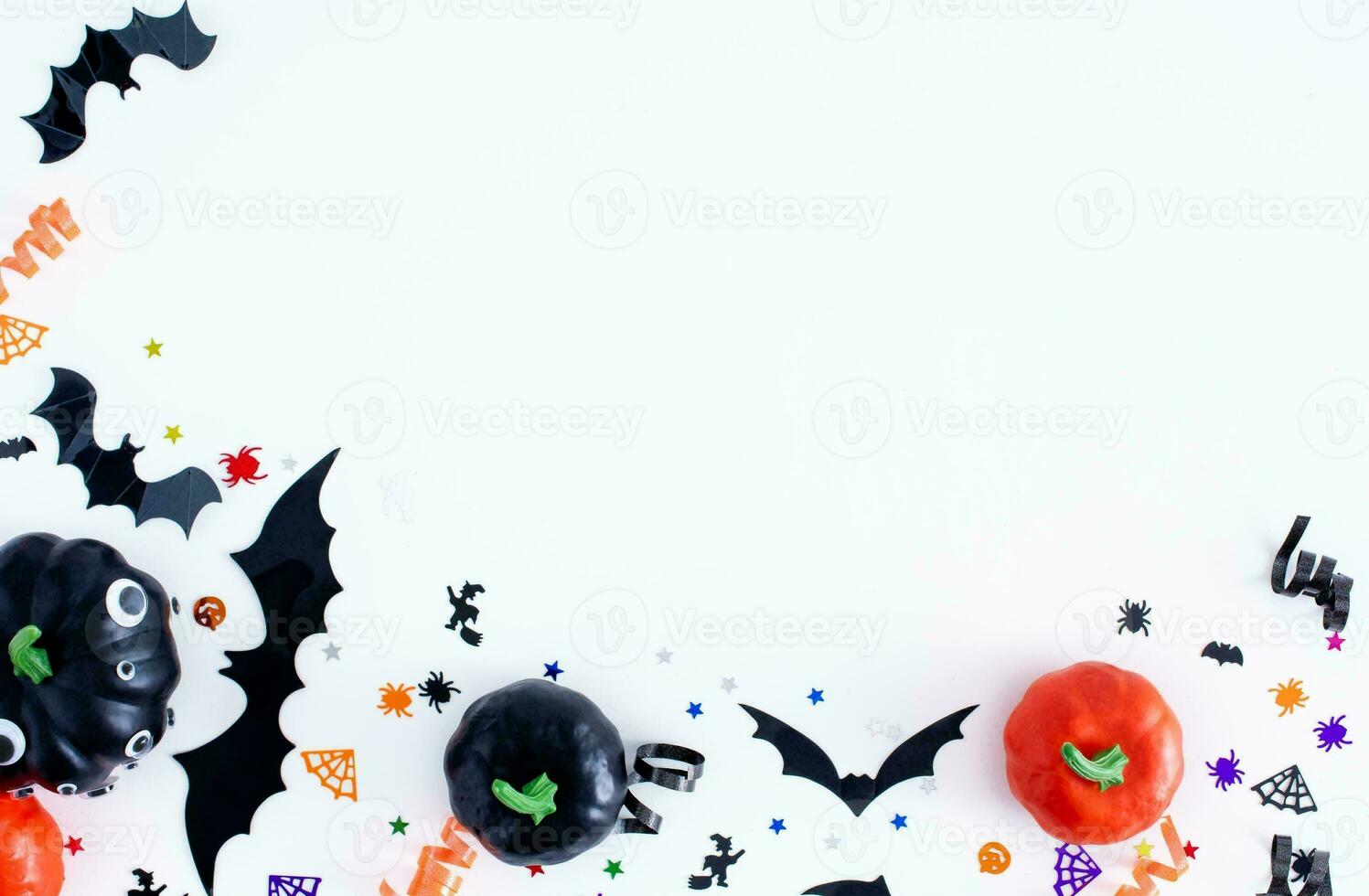 Happy Halloween banner or party invitation background with clouds bats and pumpkins photos