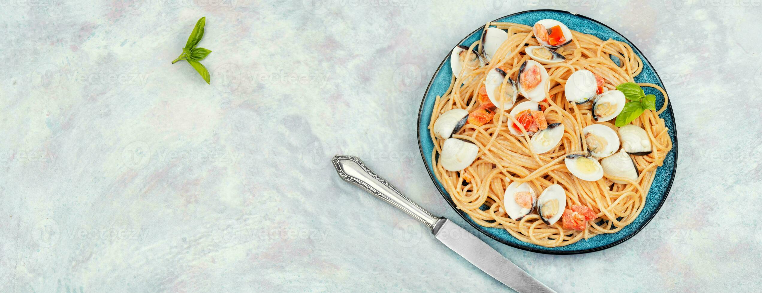 Spaghetti pasta with clams, space for text. photo