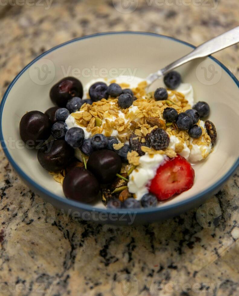 Fruit with Granola yogurt photo