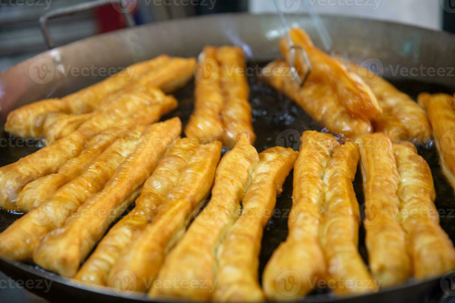 Frying Chinese Donuts photo