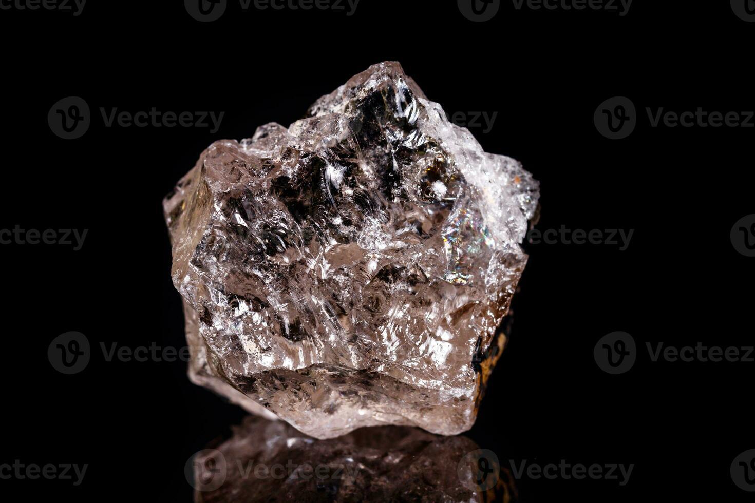 Macro mineral stone smoky quartz Rauch topaz on black background photo